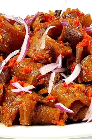 Kpomo in peppered sauce